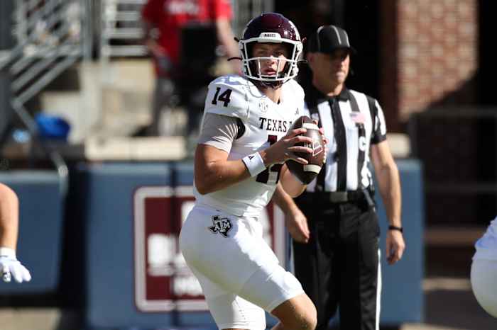 Nov 4, 2023; Oxford, Mississippi, USA; Texas A&M Aggies quarterback Max Johnson (14) passes the ball against the Mississippi Rebels during the first half at Vaught-Hemingway Stadium.